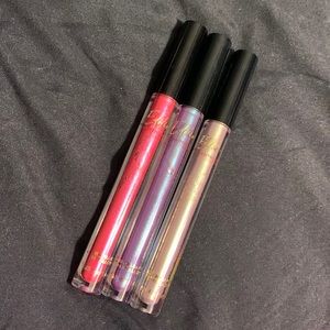 Rimmel London lipglosses : Seductress, Wild Iridescence, & Torture Tourmaline